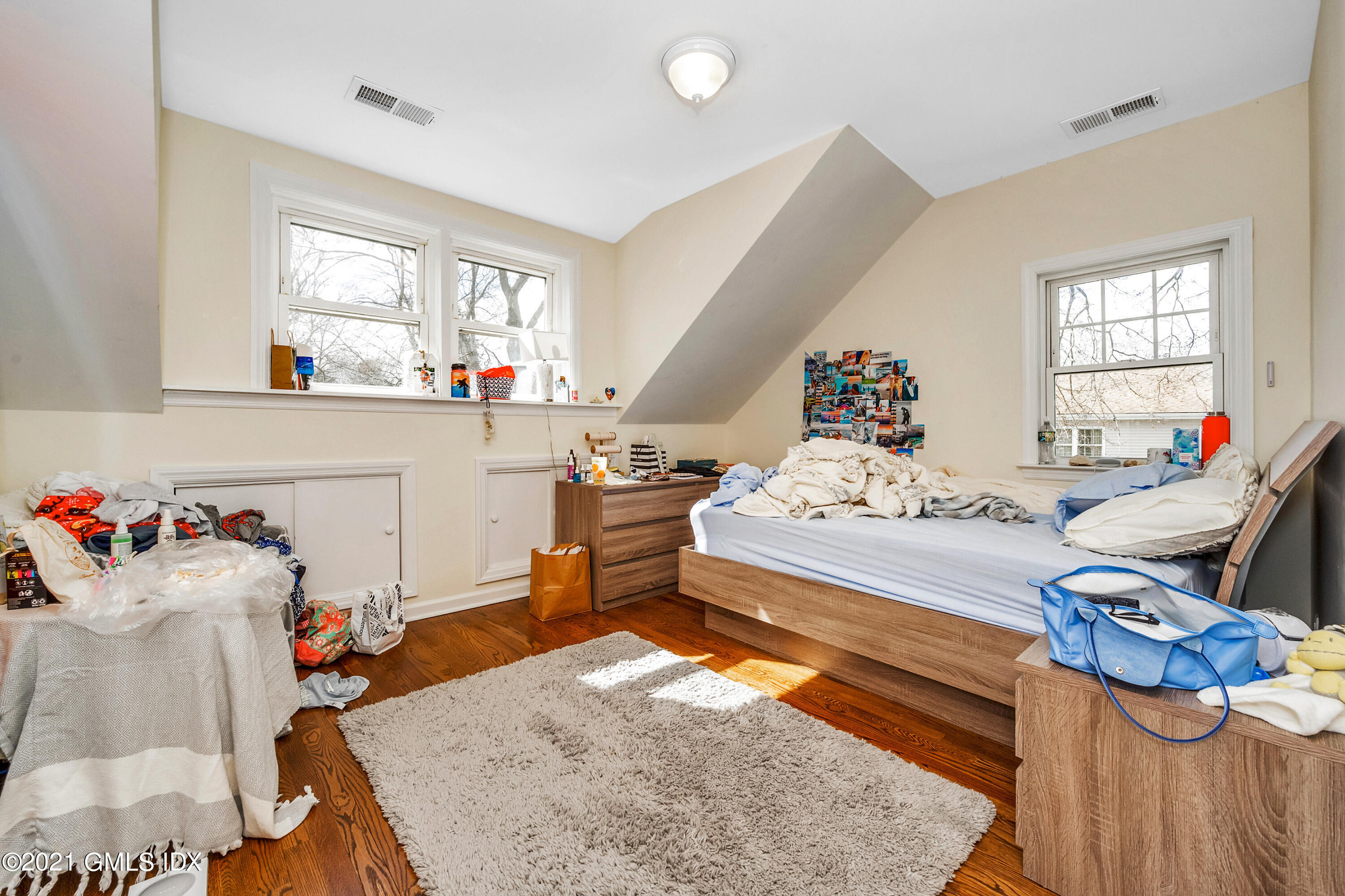 33 Sunshine Avenue Riverside, CT 06878 - Photo 13 of 18 a bedroom with furniture and a wooden floor