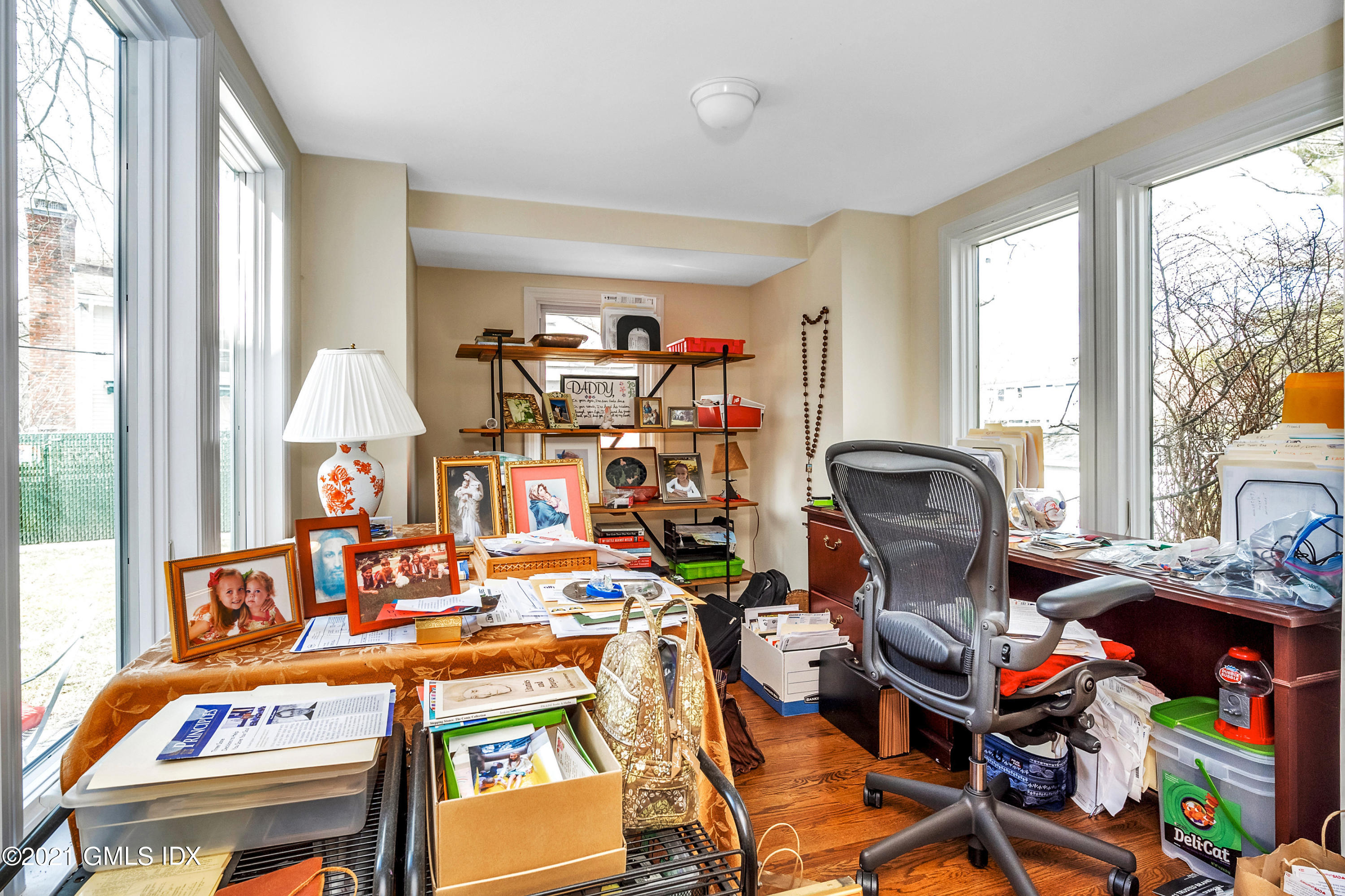 33 Sunshine Avenue Riverside, CT 06878 - Photo 7 of 18 a view of a workspace with furniture and a window