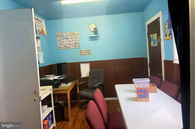 a workspace with furniture and window