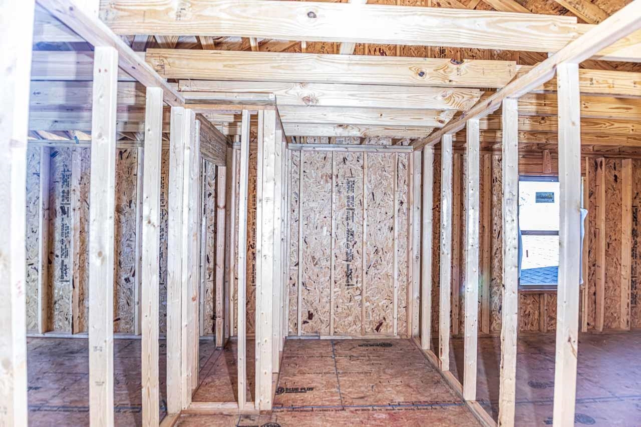 400 Barfield Avenue Henning, TN 38041 - Photo 29 of 39 a view of a hallway with wooden walls and entryway