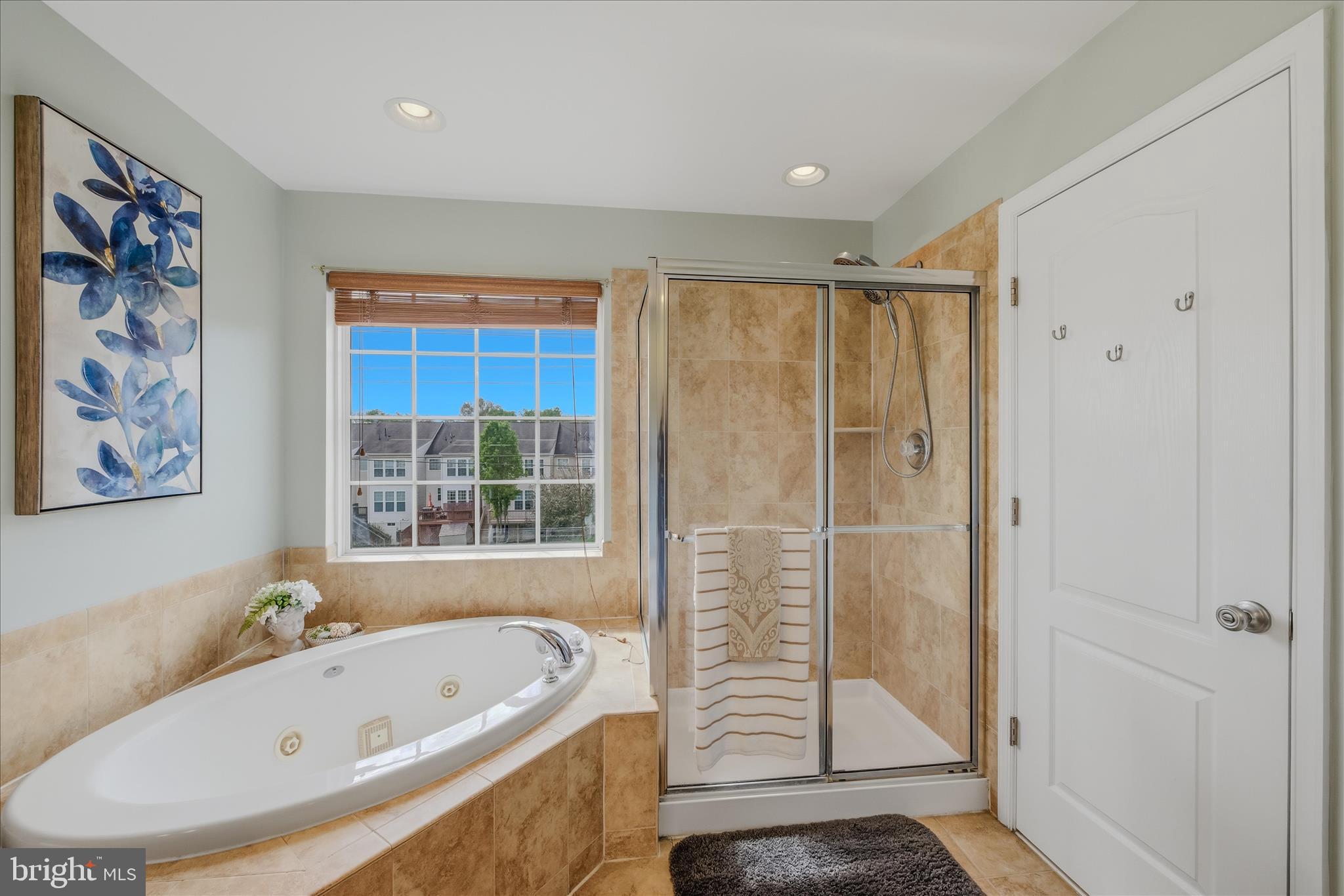 41 Weese Point Shepherdstown, WV 25443 - Photo 29 of 54 a bathroom with a tub a sink and glass door