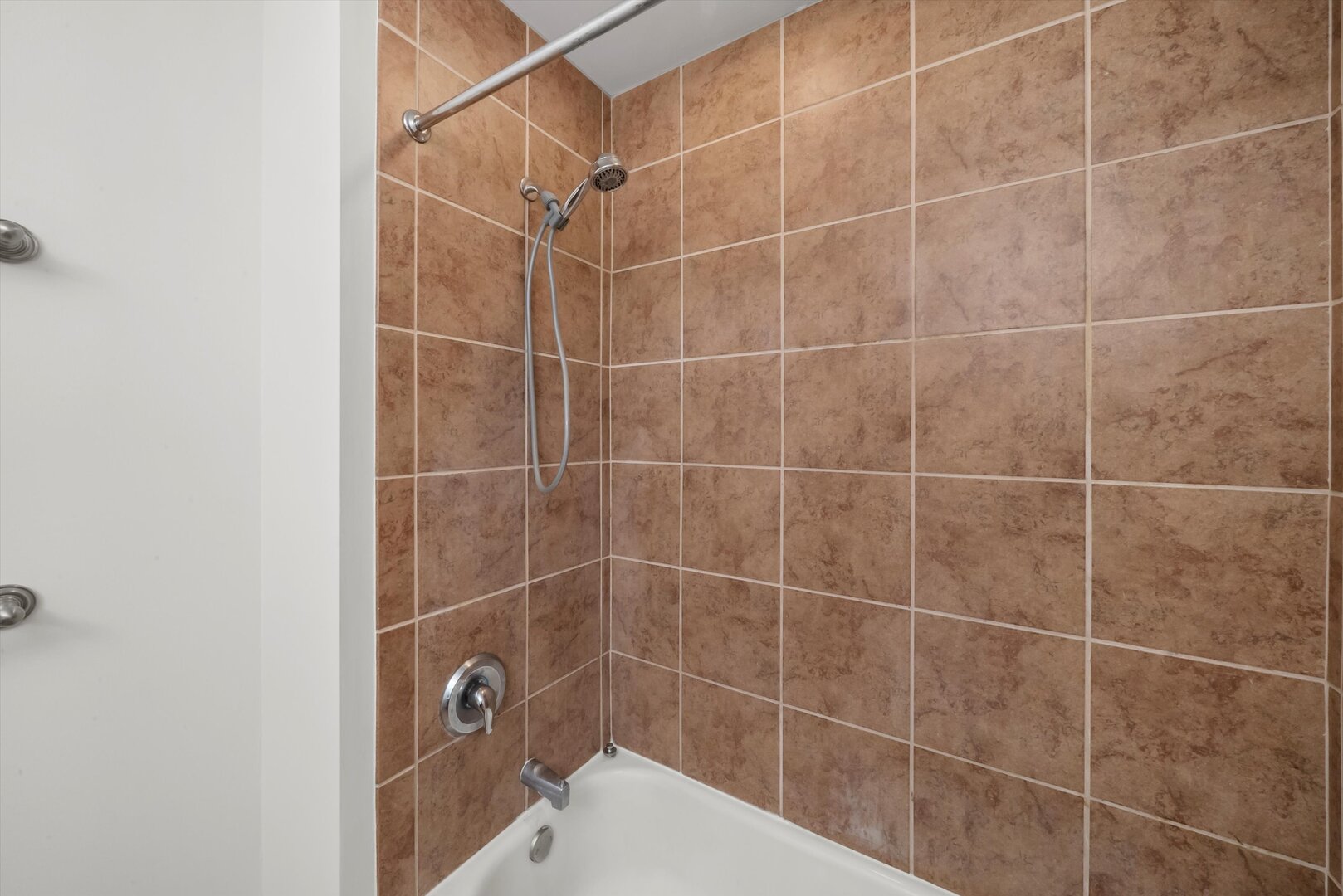 1255 South State Street, Unit 1702 Chicago, IL 60605 - Photo 26 of 36 a bathroom with a shower