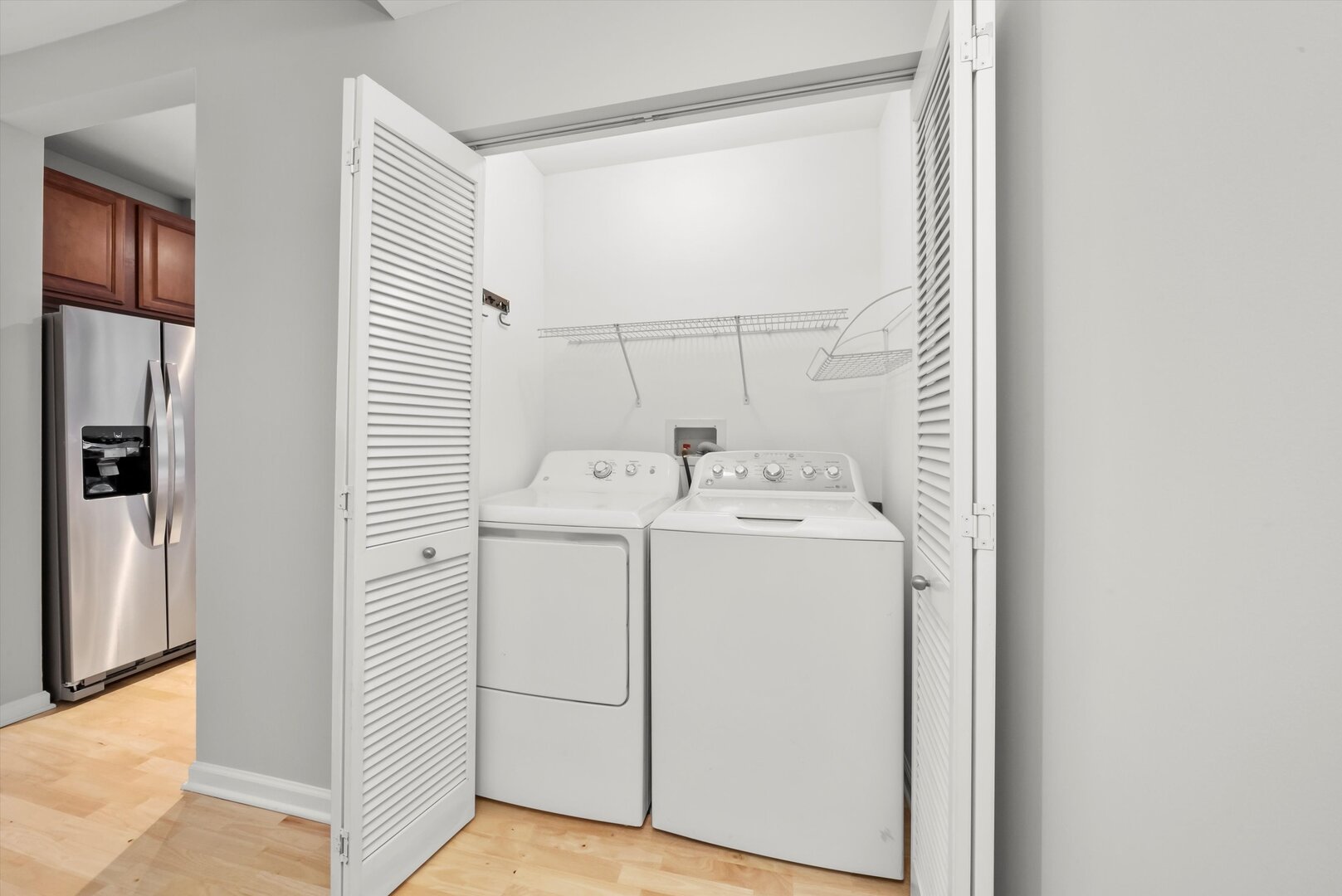 1255 South State Street, Unit 1702 Chicago, IL 60605 - Photo 33 of 36 a utility room with dryer and washer