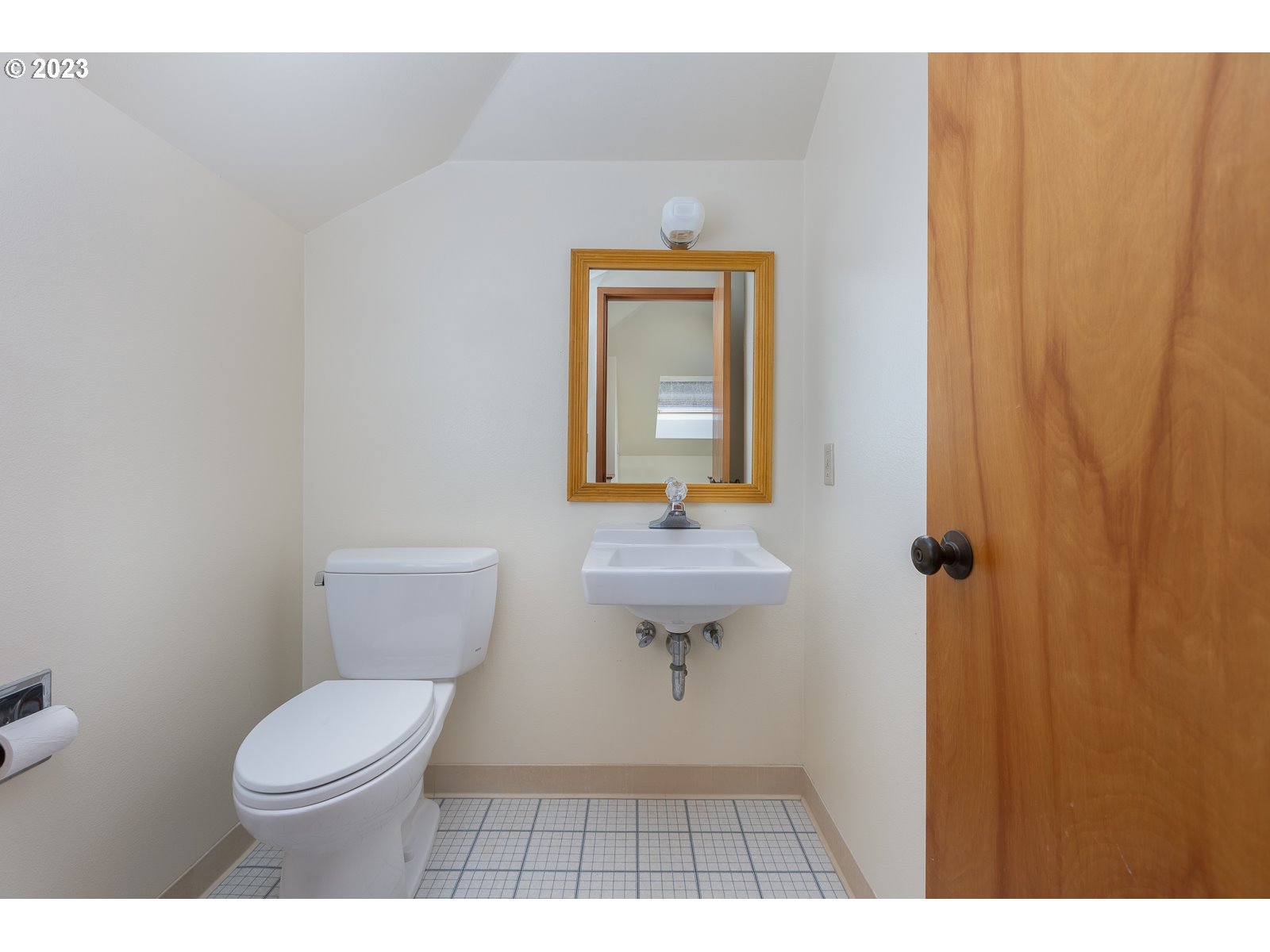 2170 Old Ranch Road Otis, OR 97368 - Photo 24 of 32 a bathroom with a toilet a sink and mirror