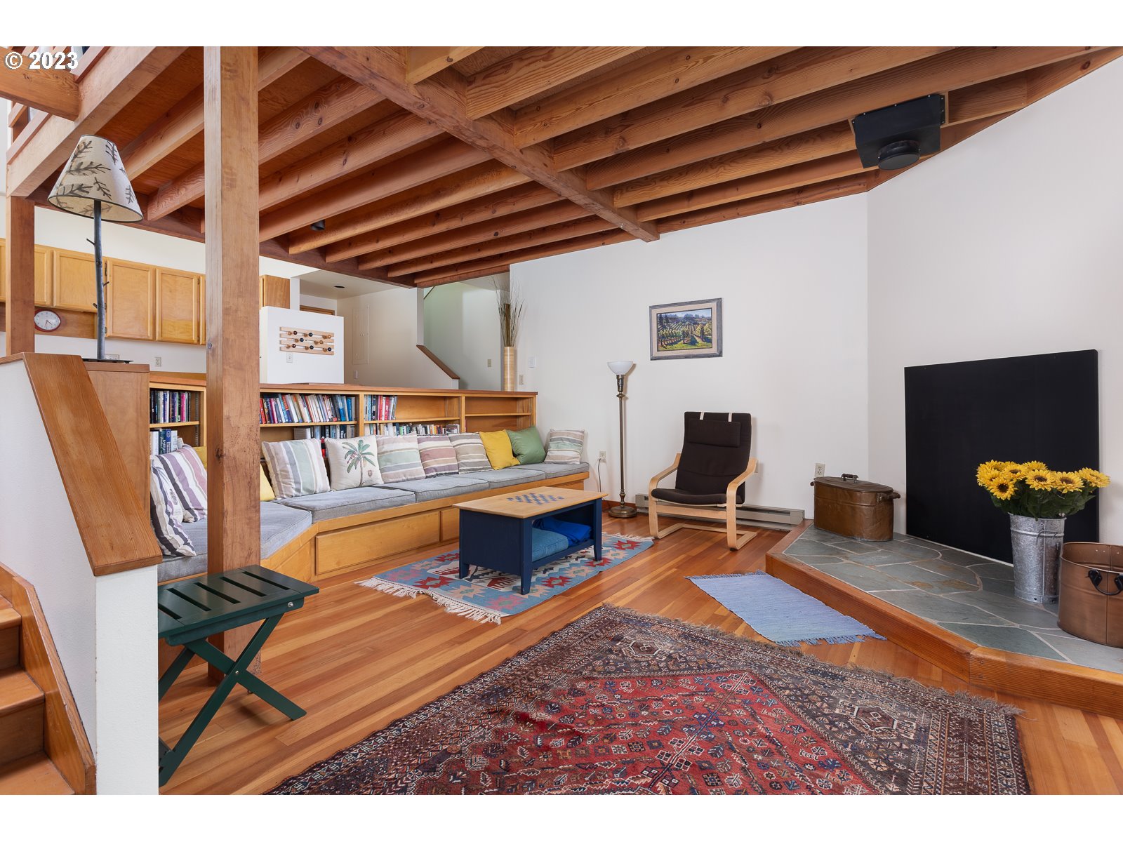 2170 Old Ranch Road Otis, OR 97368 - Photo 3 of 32 a living room with furniture a rug and a table