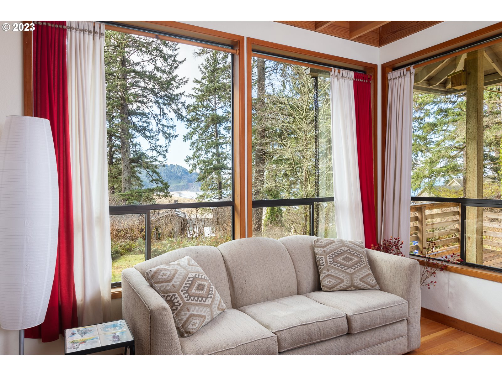 2170 Old Ranch Road Otis, OR 97368 - Photo 6 of 32 a living room with furniture and a large window