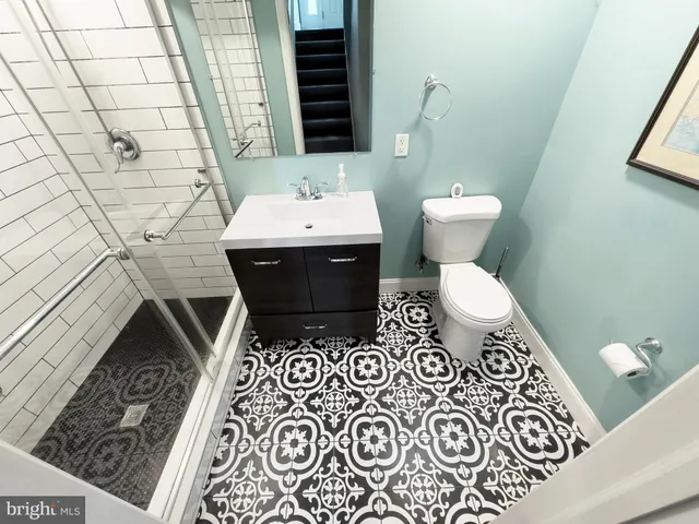 a bathroom with a sink and a toilet