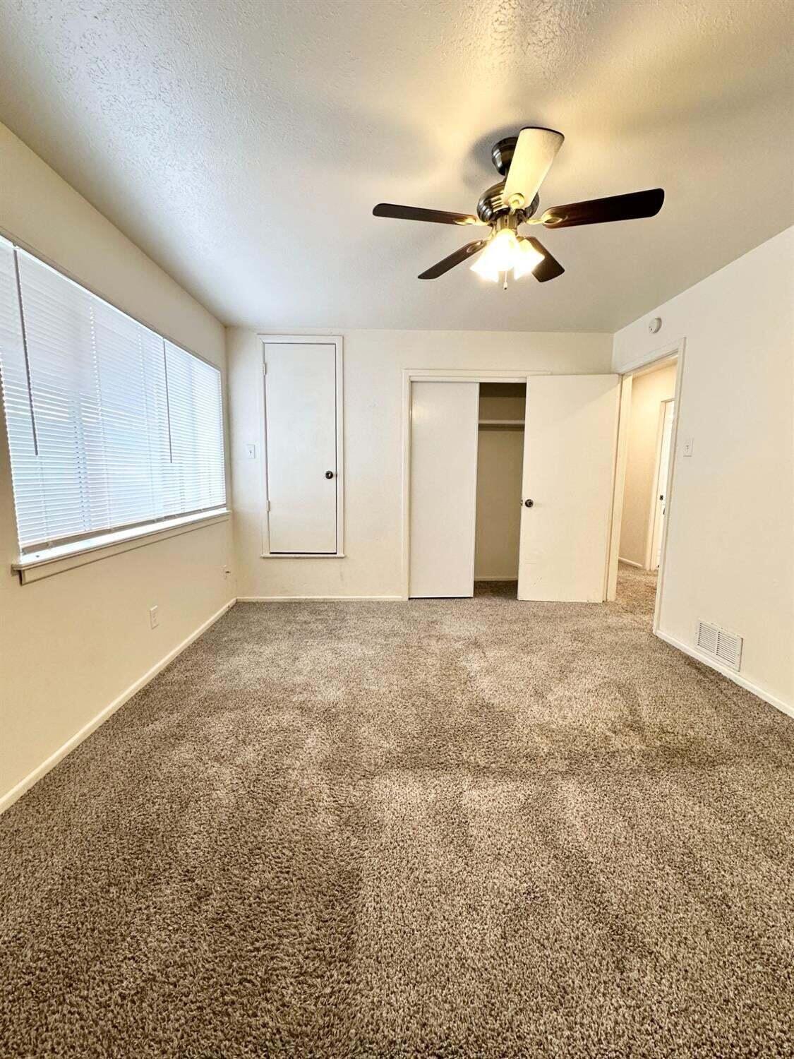 1303 65th Street Lubbock, TX 79412 - Photo 10 of 11 a view of an empty room