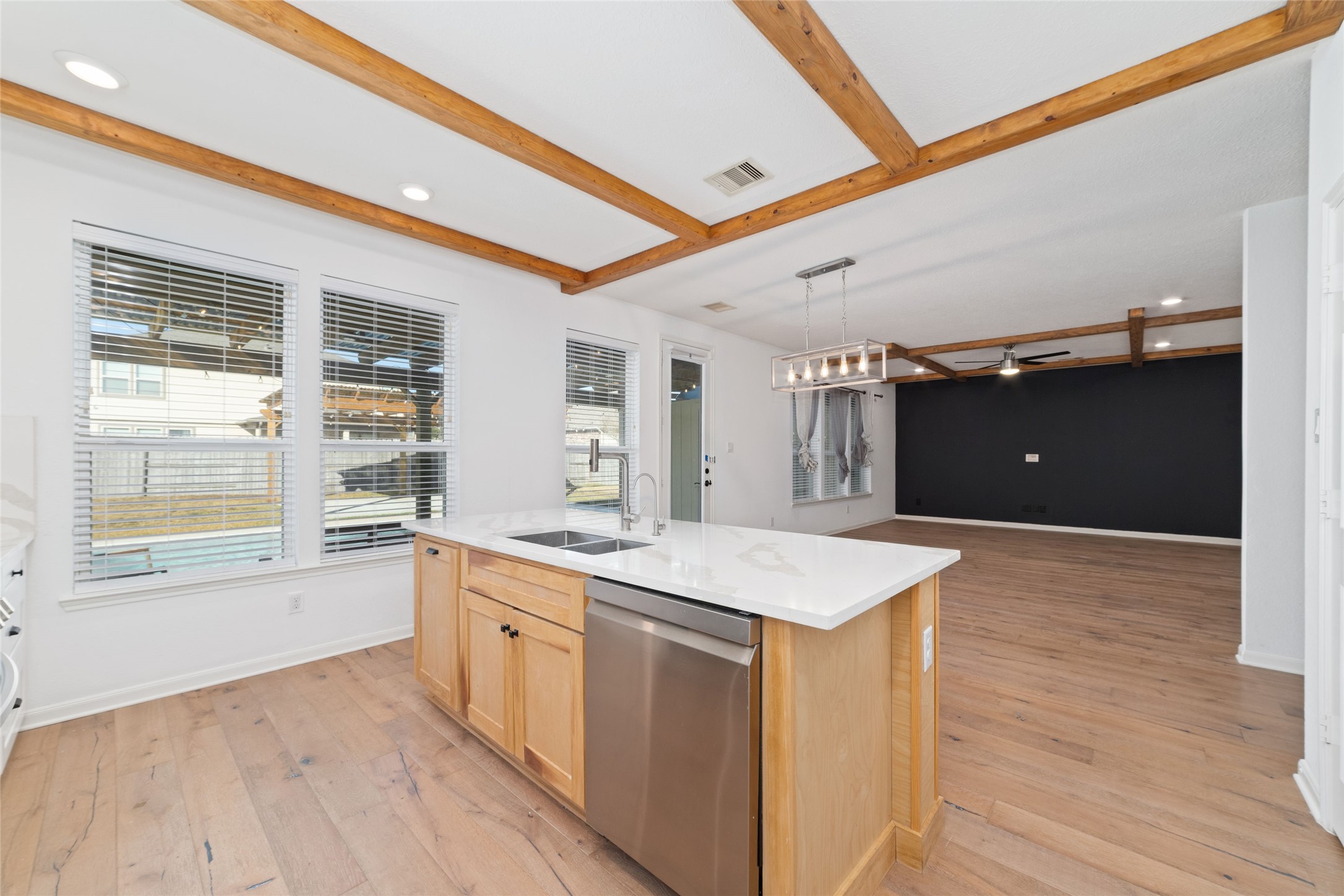 3508 Saxton Green Road Pearland, TX 77584 - Photo 14 of 45 a view of a kitchen counter top space and wooden floor