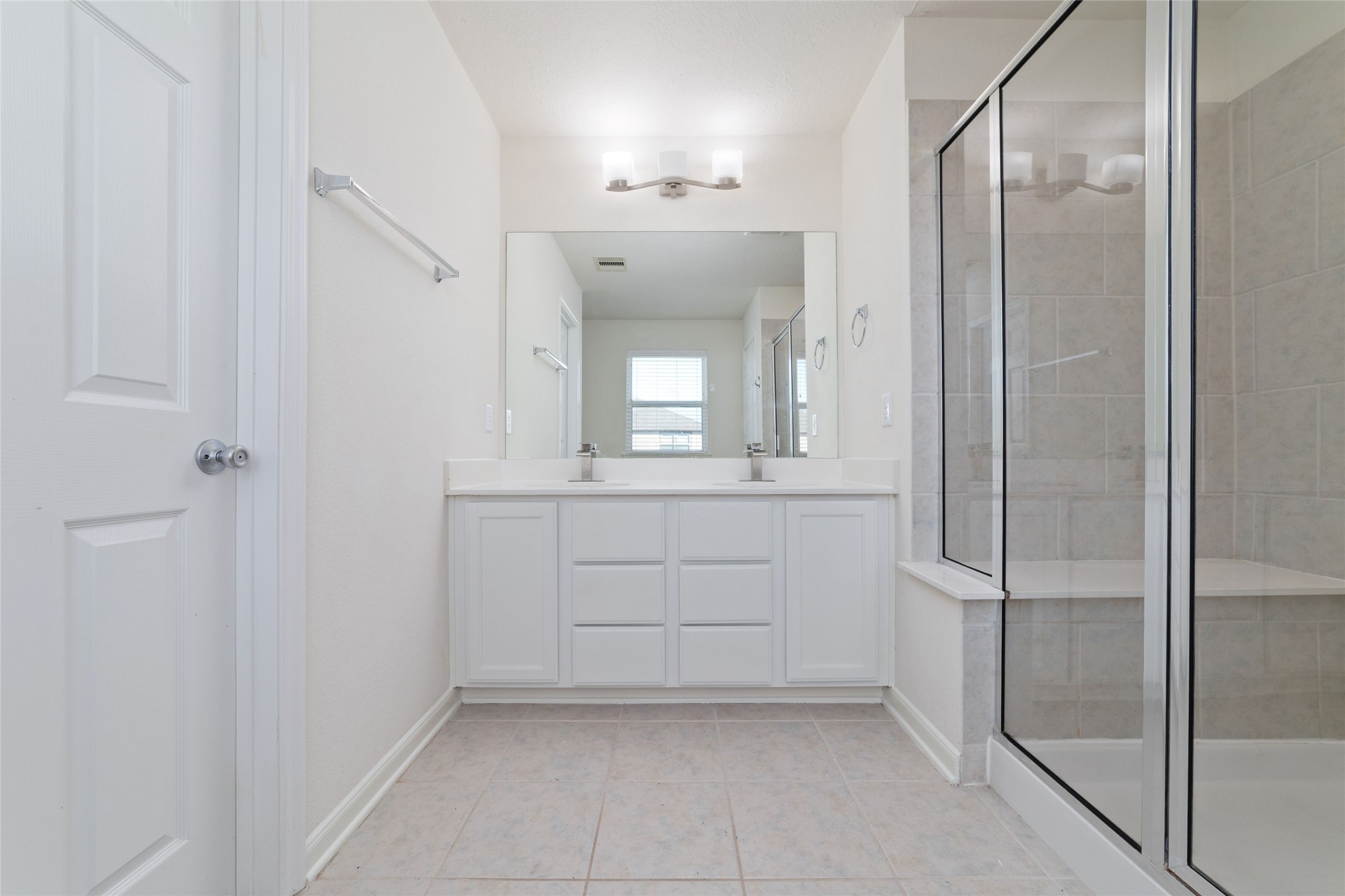 3508 Saxton Green Road Pearland, TX 77584 - Photo 18 of 45 a bathroom with a mirror sink and vanity