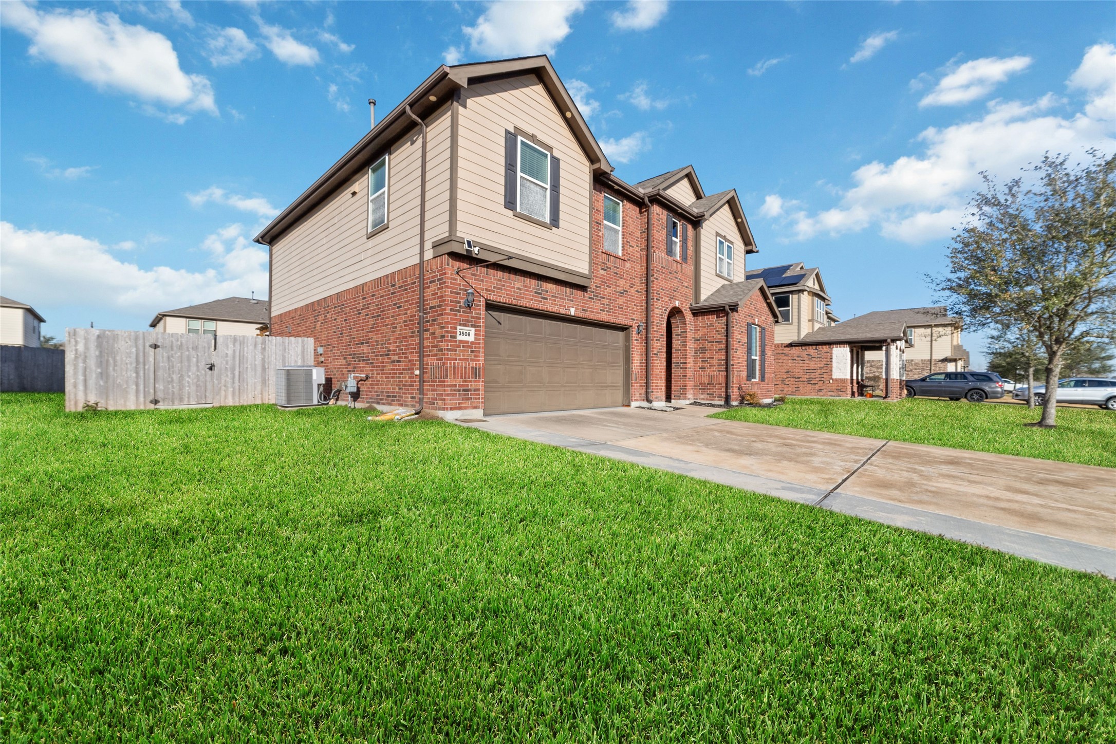 3508 Saxton Green Road Pearland, TX 77584 - Photo 2 of 45 a front view of house with yard and green space