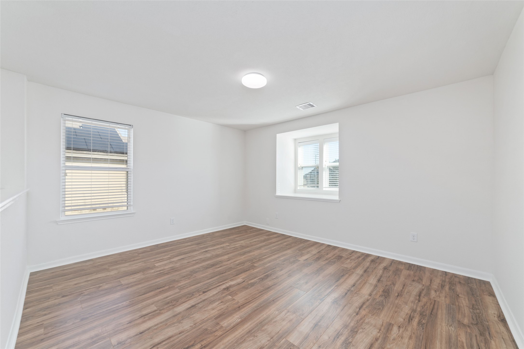 3508 Saxton Green Road Pearland, TX 77584 - Photo 24 of 45 a view of a room with wooden floor and window