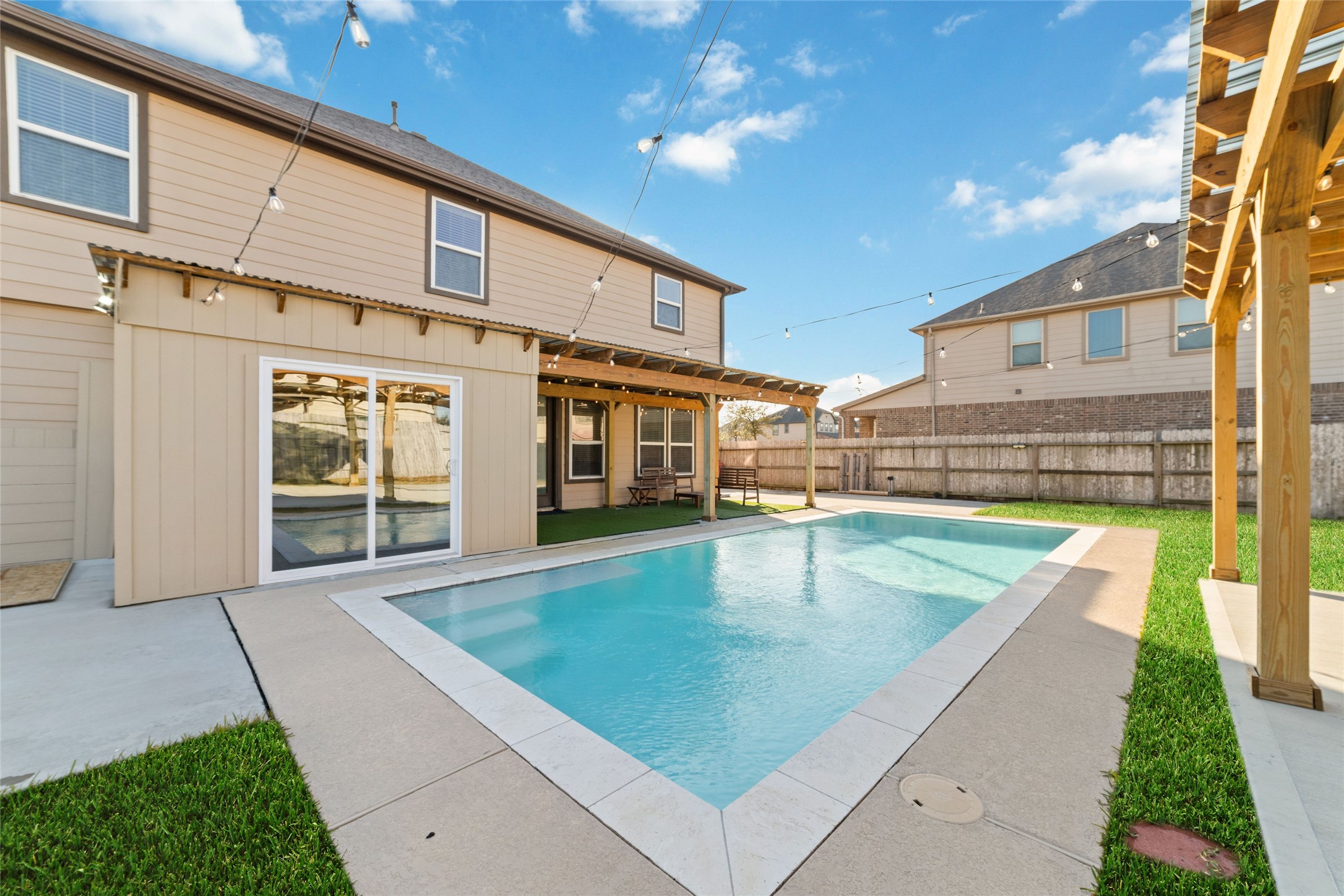 3508 Saxton Green Road Pearland, TX 77584 - Photo 30 of 45 a view of a house with a swimming pool