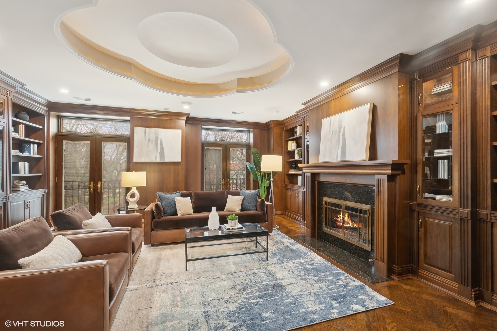 1261 West Flournoy Street Chicago, IL 60607 - Photo 16 of 43 a living room with furniture and a fireplace