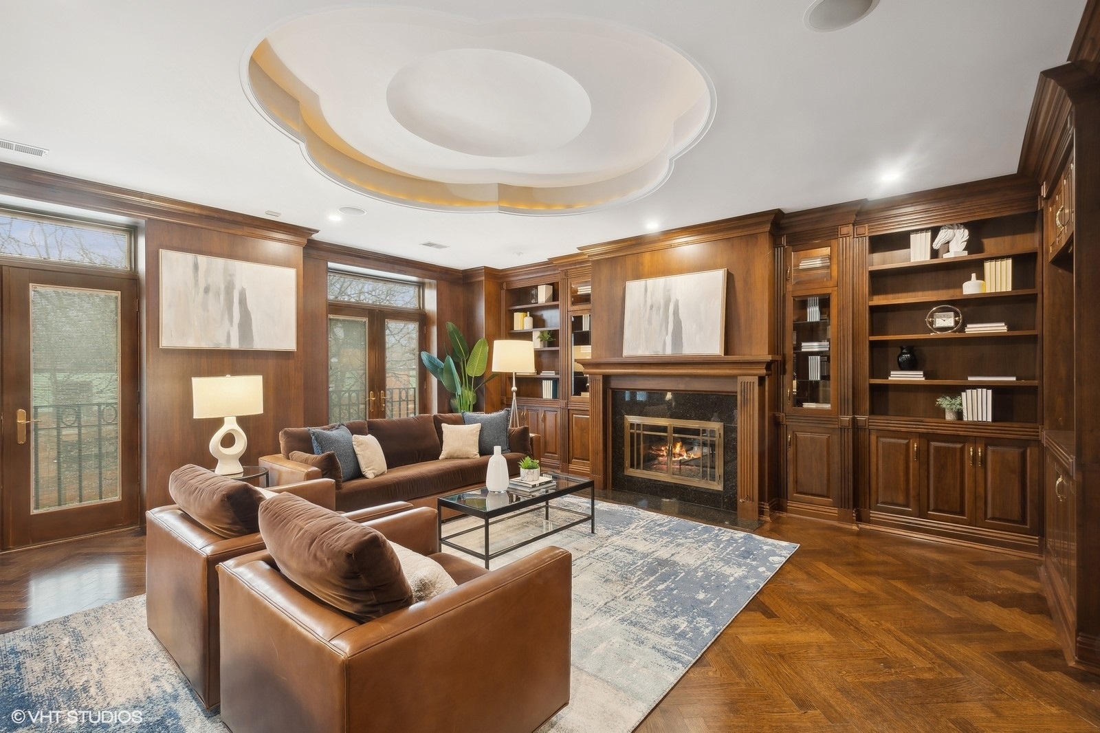 1261 West Flournoy Street Chicago, IL 60607 - Photo 17 of 43 a living room with fireplace furniture and a flat screen tv