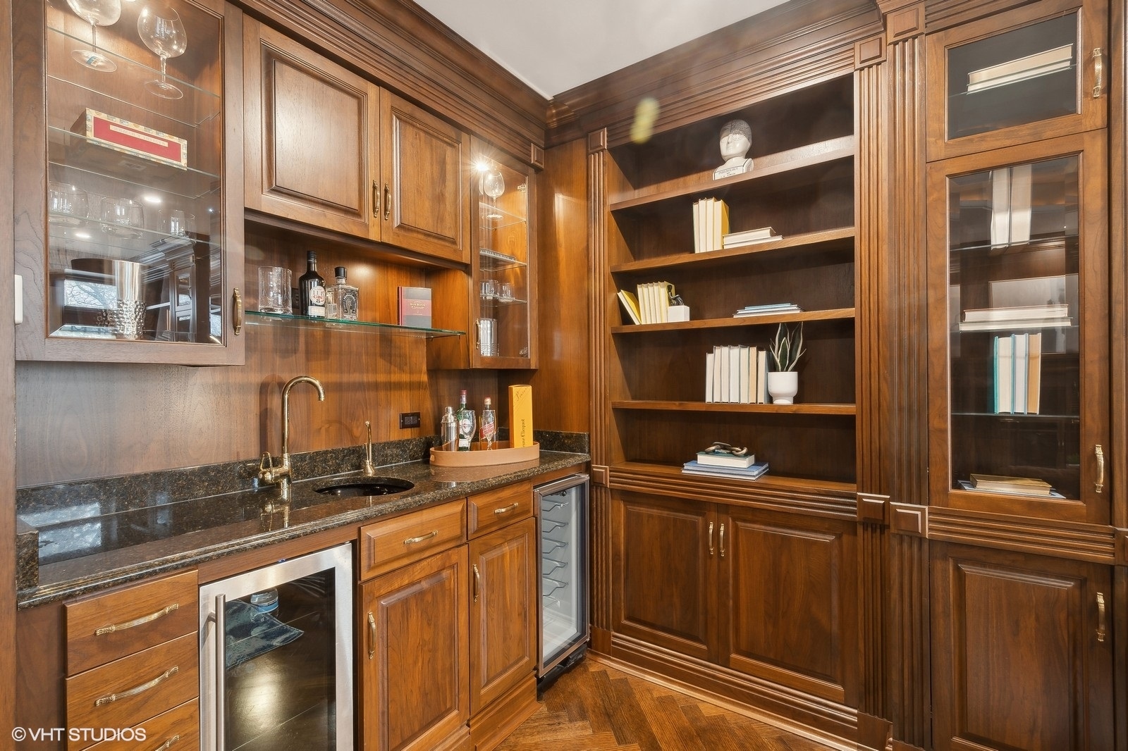 1261 West Flournoy Street Chicago, IL 60607 - Photo 18 of 43 a kitchen with stainless steel appliances granite countertop a sink and cabinets
