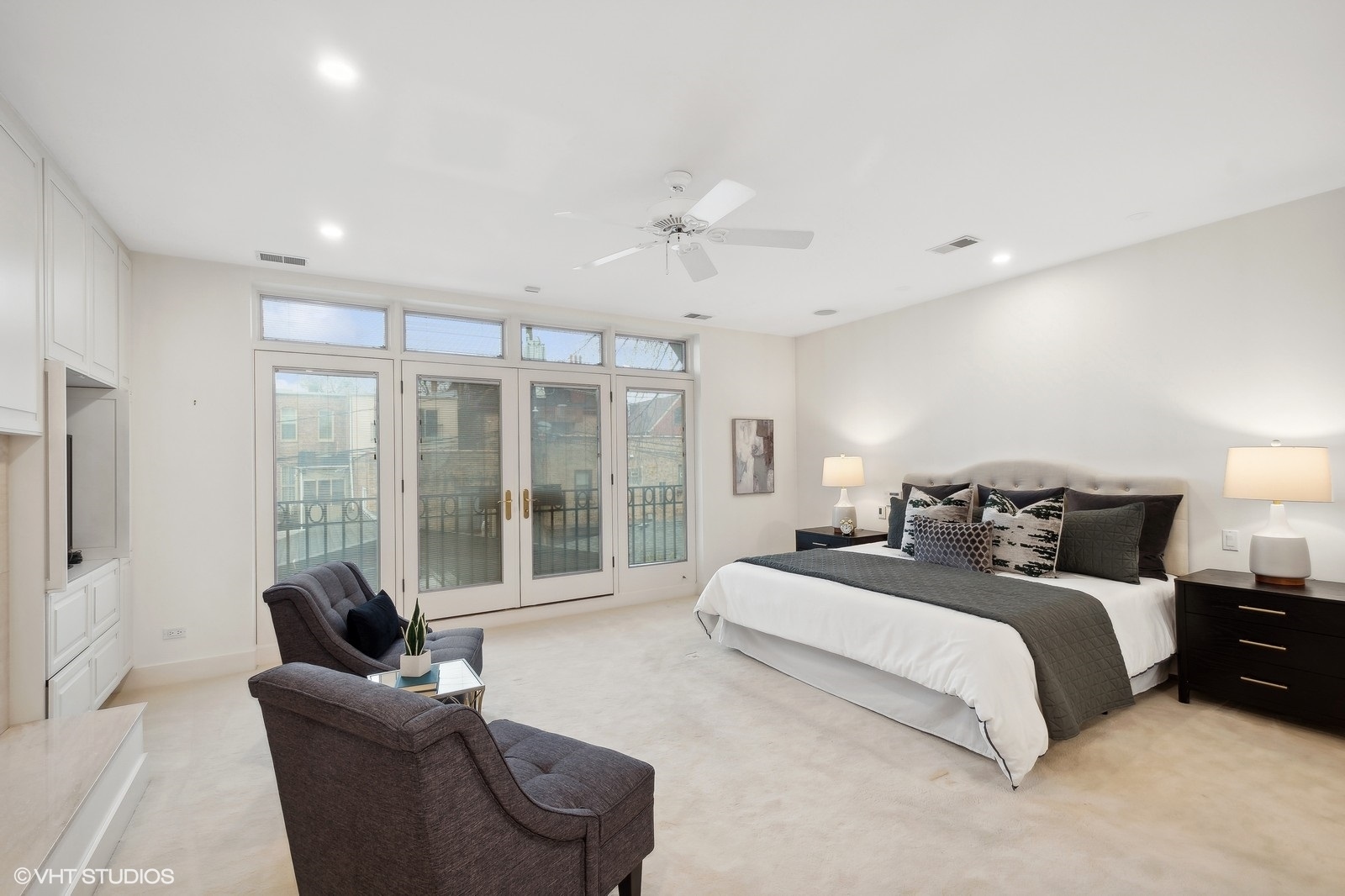 1261 West Flournoy Street Chicago, IL 60607 - Photo 20 of 43 a bedroom with a bed and glass walk in closet