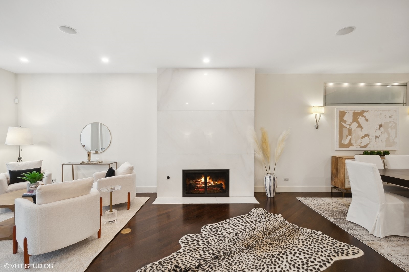 1261 West Flournoy Street Chicago, IL 60607 - Photo 2 of 43 a living room with furniture and a fireplace