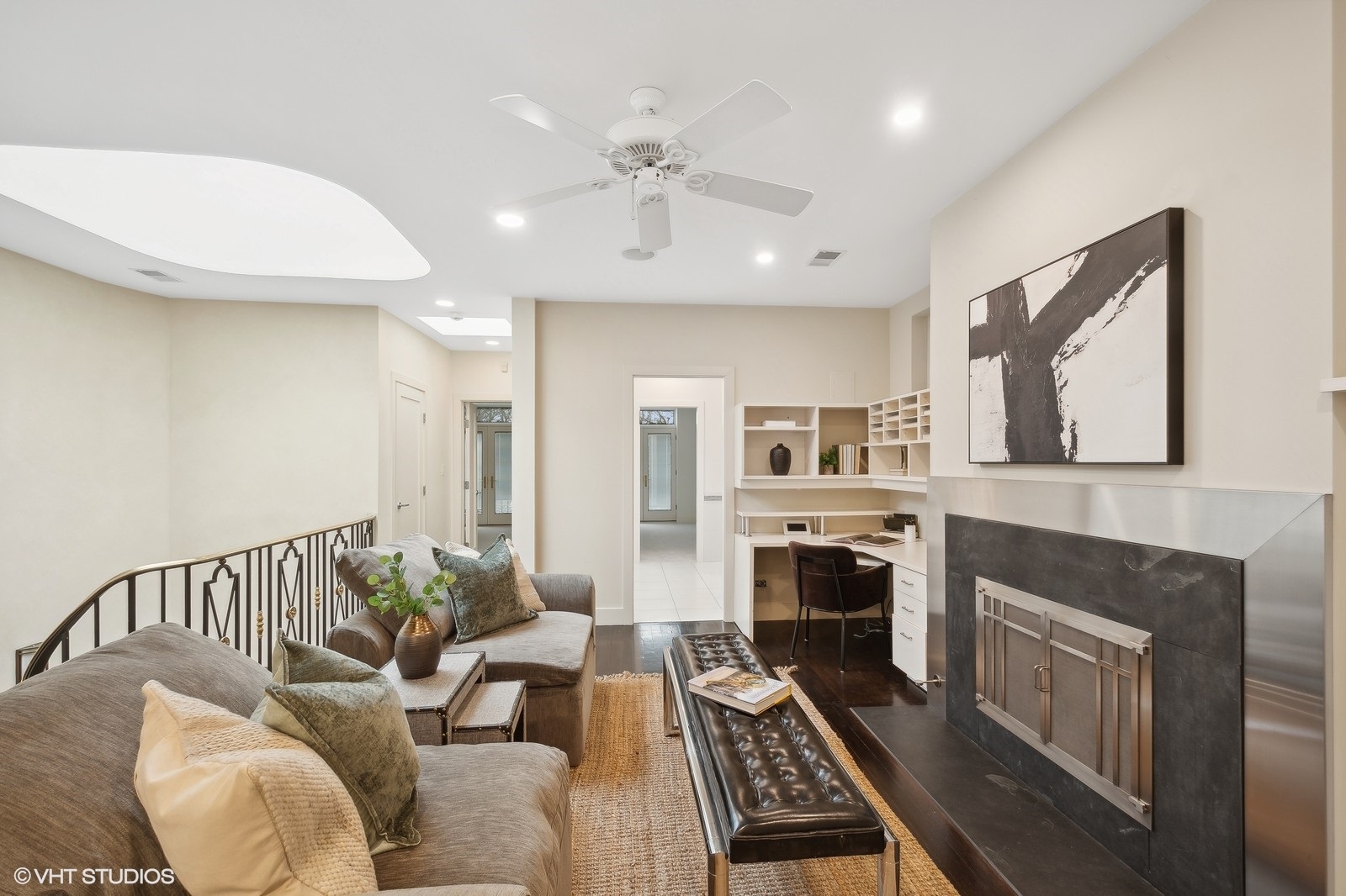 1261 West Flournoy Street Chicago, IL 60607 - Photo 26 of 43 a living room with furniture a fireplace and a flat screen tv