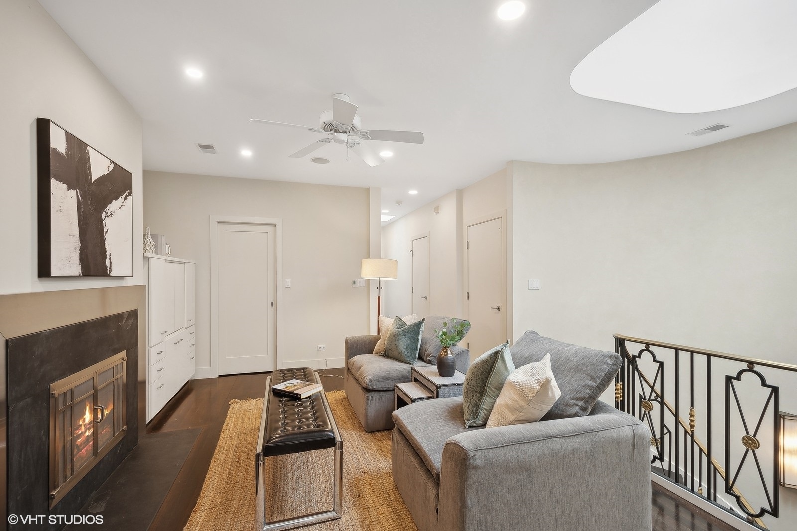 1261 West Flournoy Street Chicago, IL 60607 - Photo 27 of 43 a living room with furniture and a fireplace