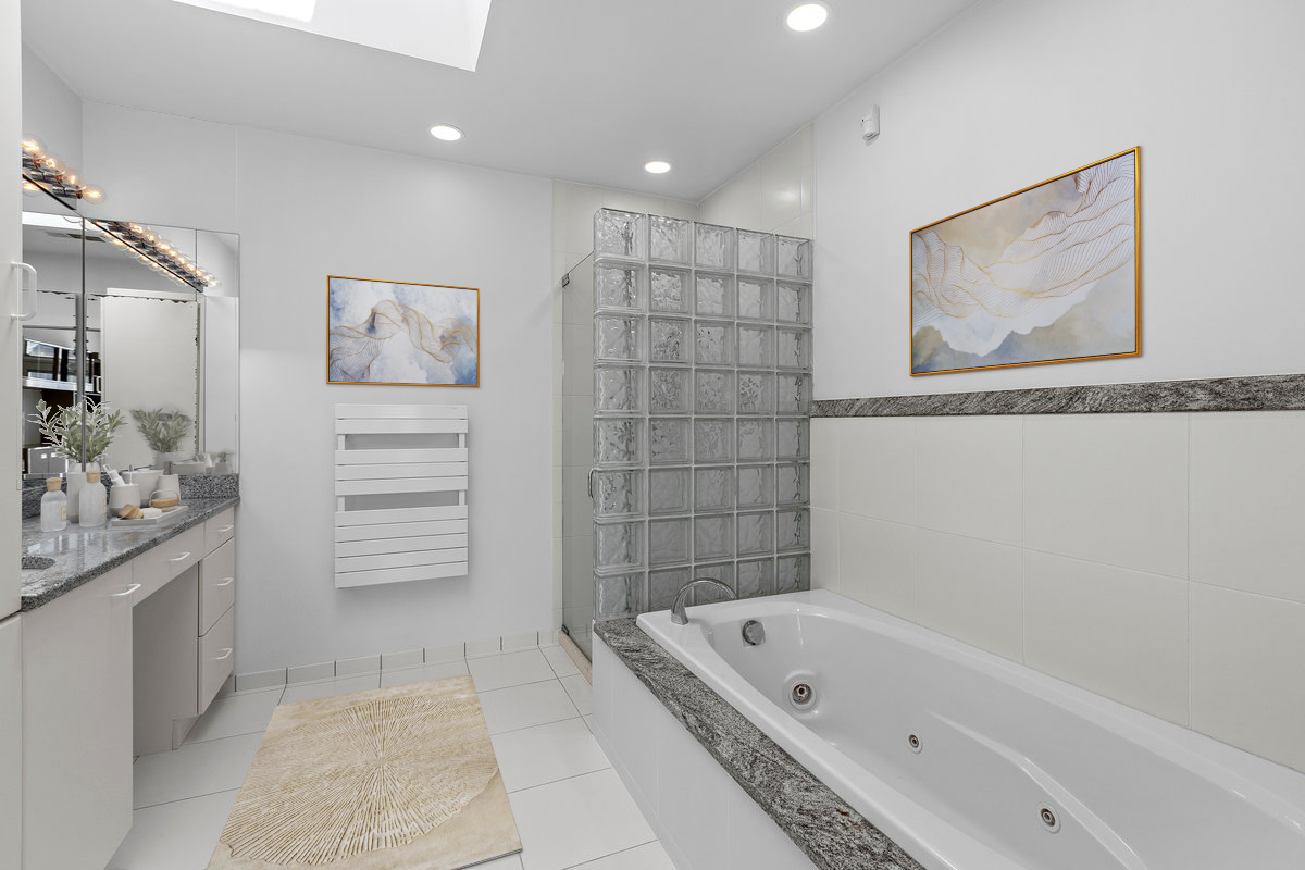 1261 West Flournoy Street Chicago, IL 60607 - Photo 31 of 43 a bathroom with a tub a sink and a shower