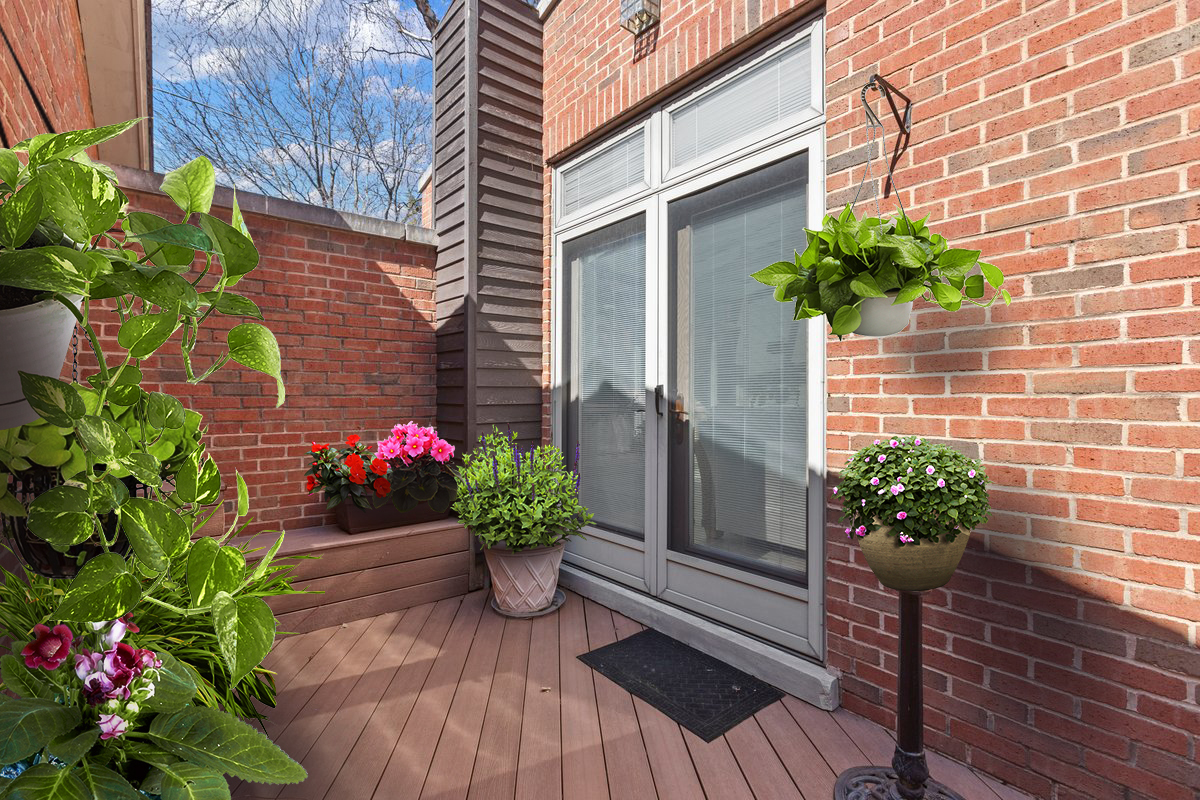 1261 West Flournoy Street Chicago, IL 60607 - Photo 38 of 43 a view of a entryway with flower pots