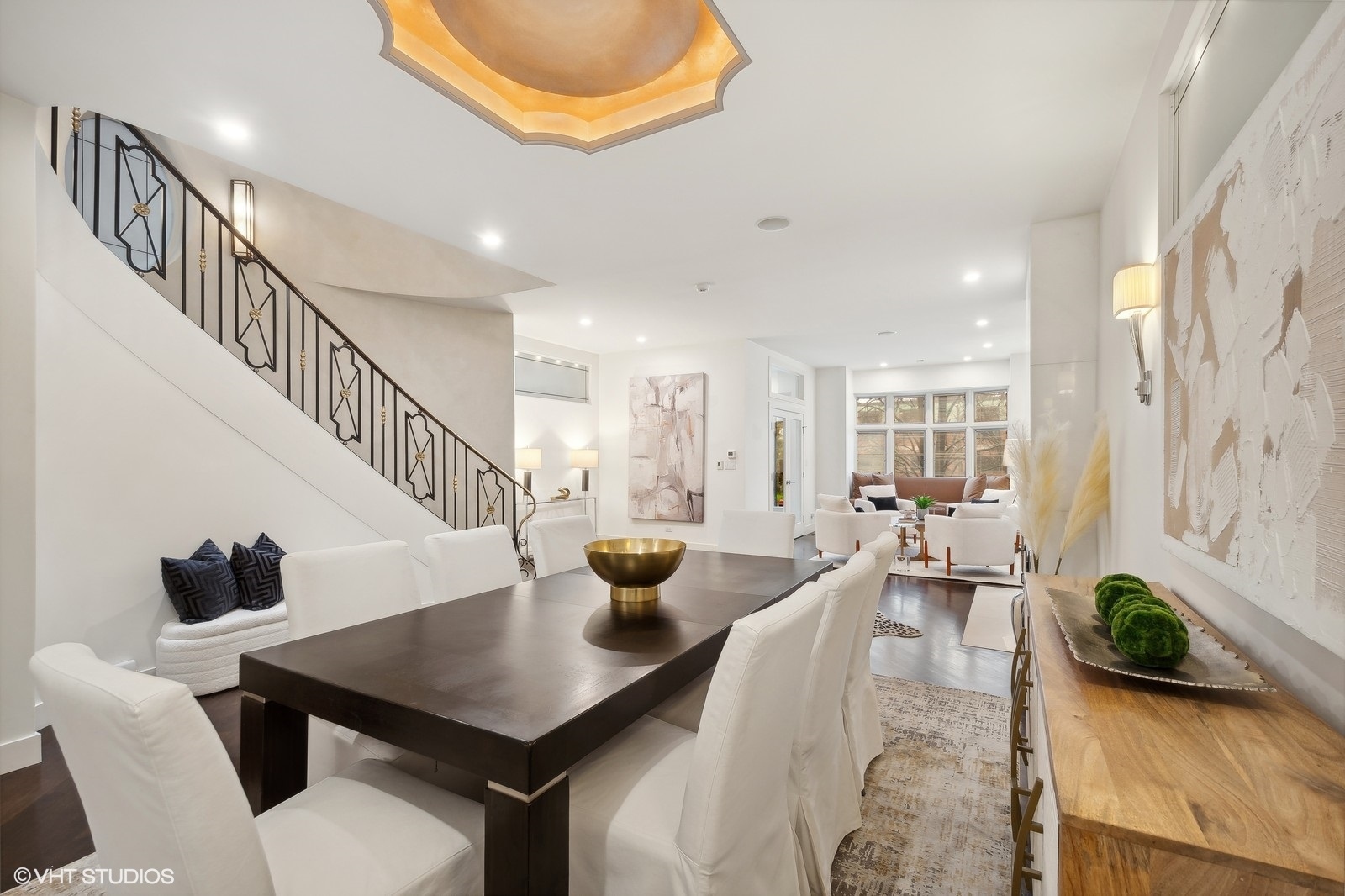 1261 West Flournoy Street Chicago, IL 60607 - Photo 5 of 43 a view of a dining room with furniture and a potted plant
