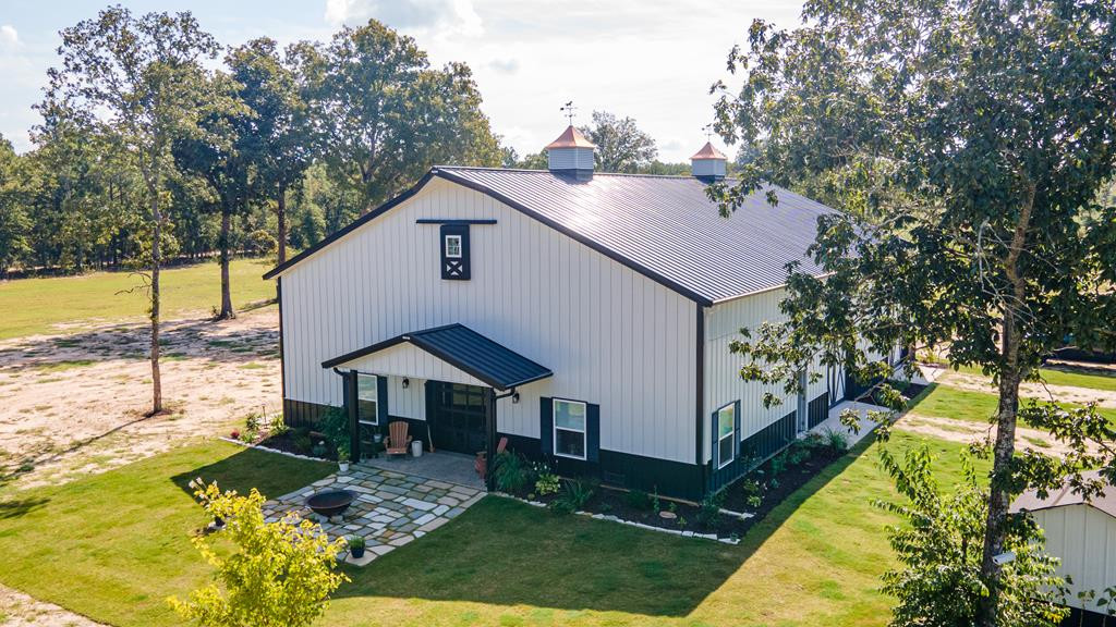 775 Colbert Bridge Road Windsor, SC 29856 - Photo 8 of 33 a aerial view of a house with swimming pool next to a yard