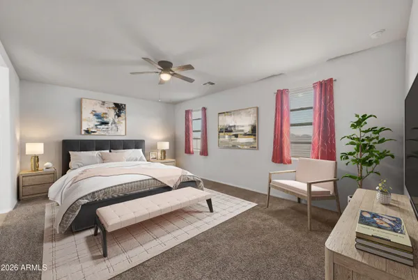 a bedroom with a bed furniture and a window