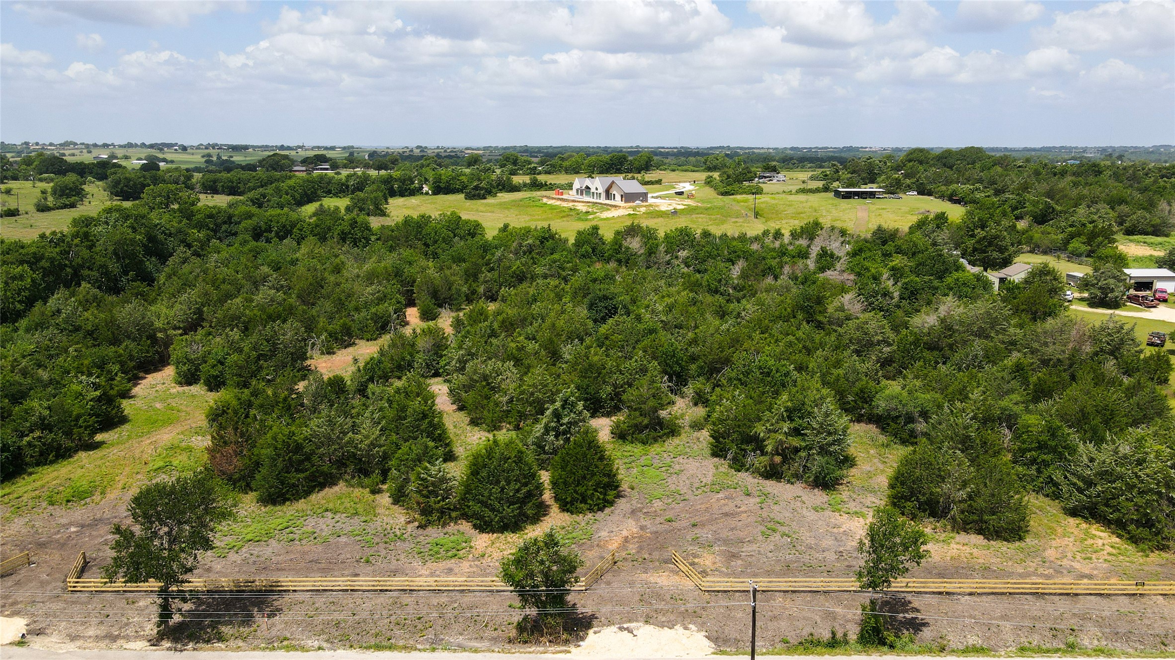 Lot 7 Wonder Hill Road Chappell Hill, TX 77426 - Photo 9 of 13 a view of a yard with an outdoor space