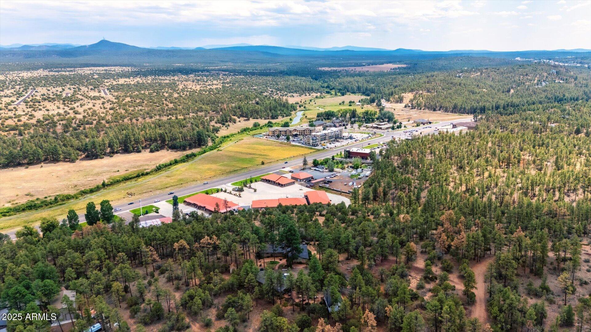 0 South 8th Street, Unit D Show Low, AZ 85901 - Photo 11 of 18 a view of a city with mountains in the background
