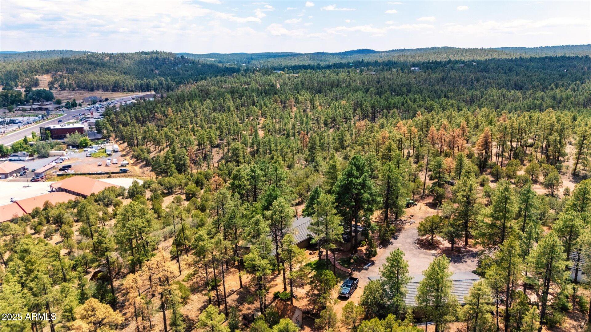0 South 8th Street, Unit D Show Low, AZ 85901 - Photo 14 of 18 a view of a town with mountains in the background