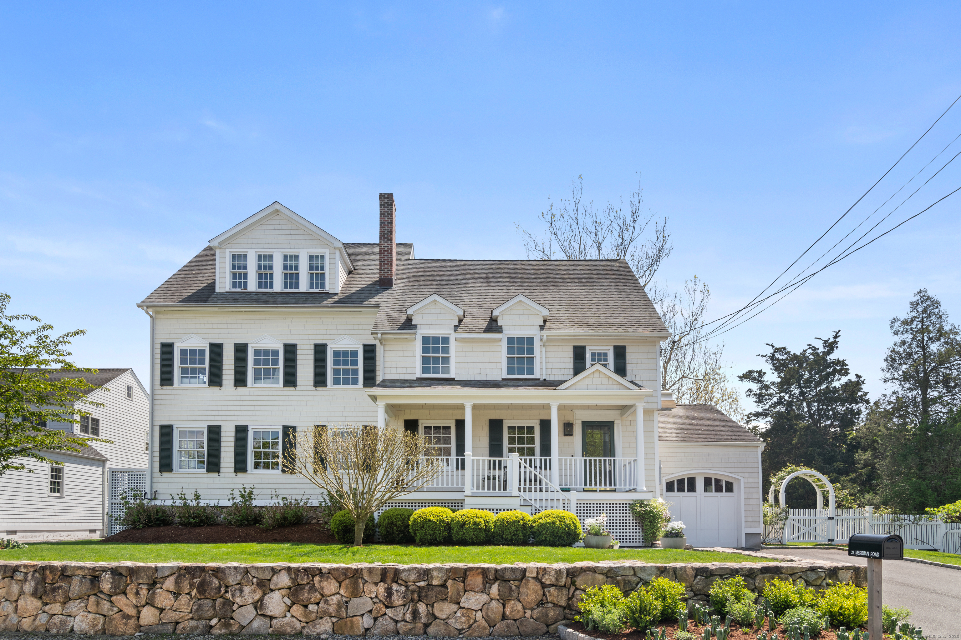 front view of a house with a small yard
