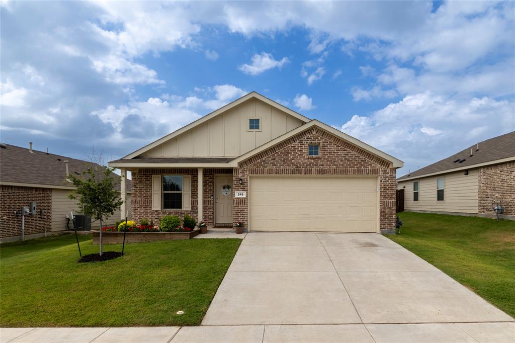 349 Ranchito Pass Fort Worth, TX 76052 - Photo 1 of 1 a front view of house with yard and green space