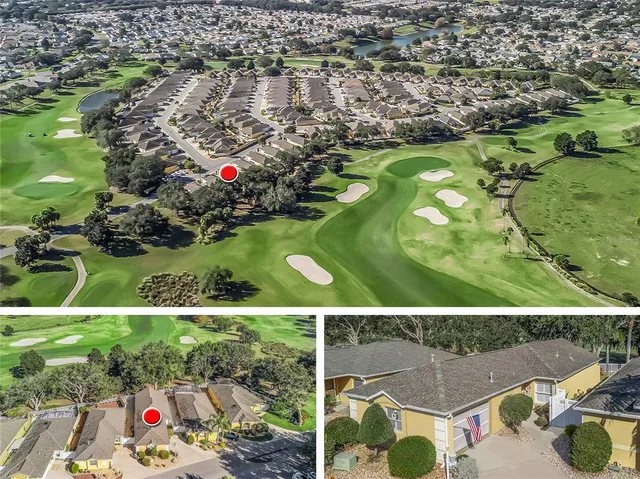 an aerial view of residential houses with outdoor space and swimming pool
