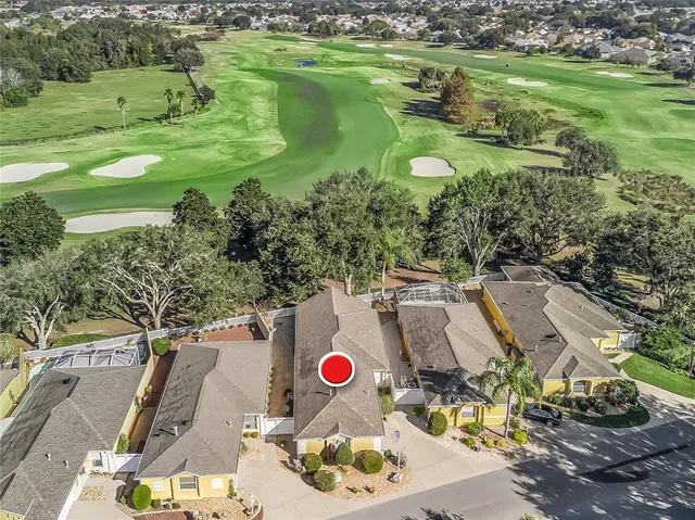 a view of a lake with a yard