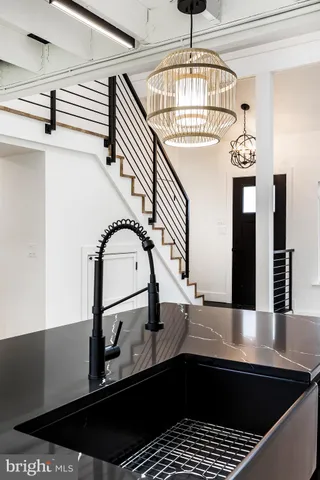 a view of a living room and entryway