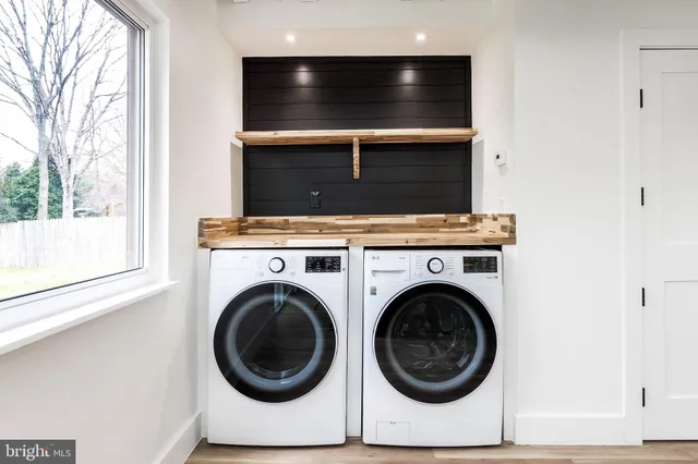 a utility room with dryer and washer