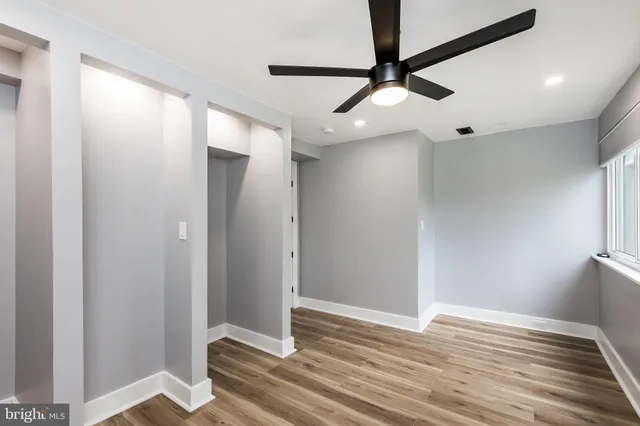 a view of entryway with wooden floor