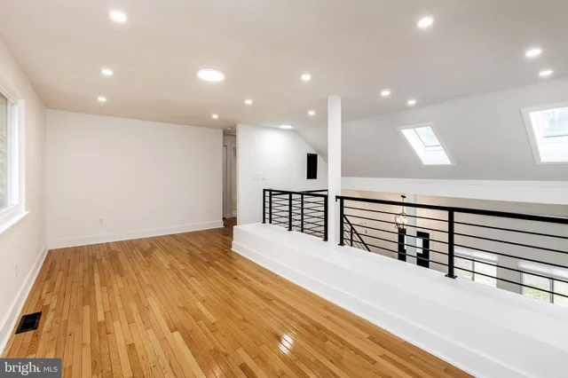 a view of a hallway with a large window
