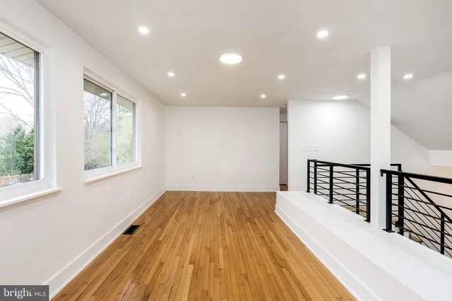 a view of a room with windows