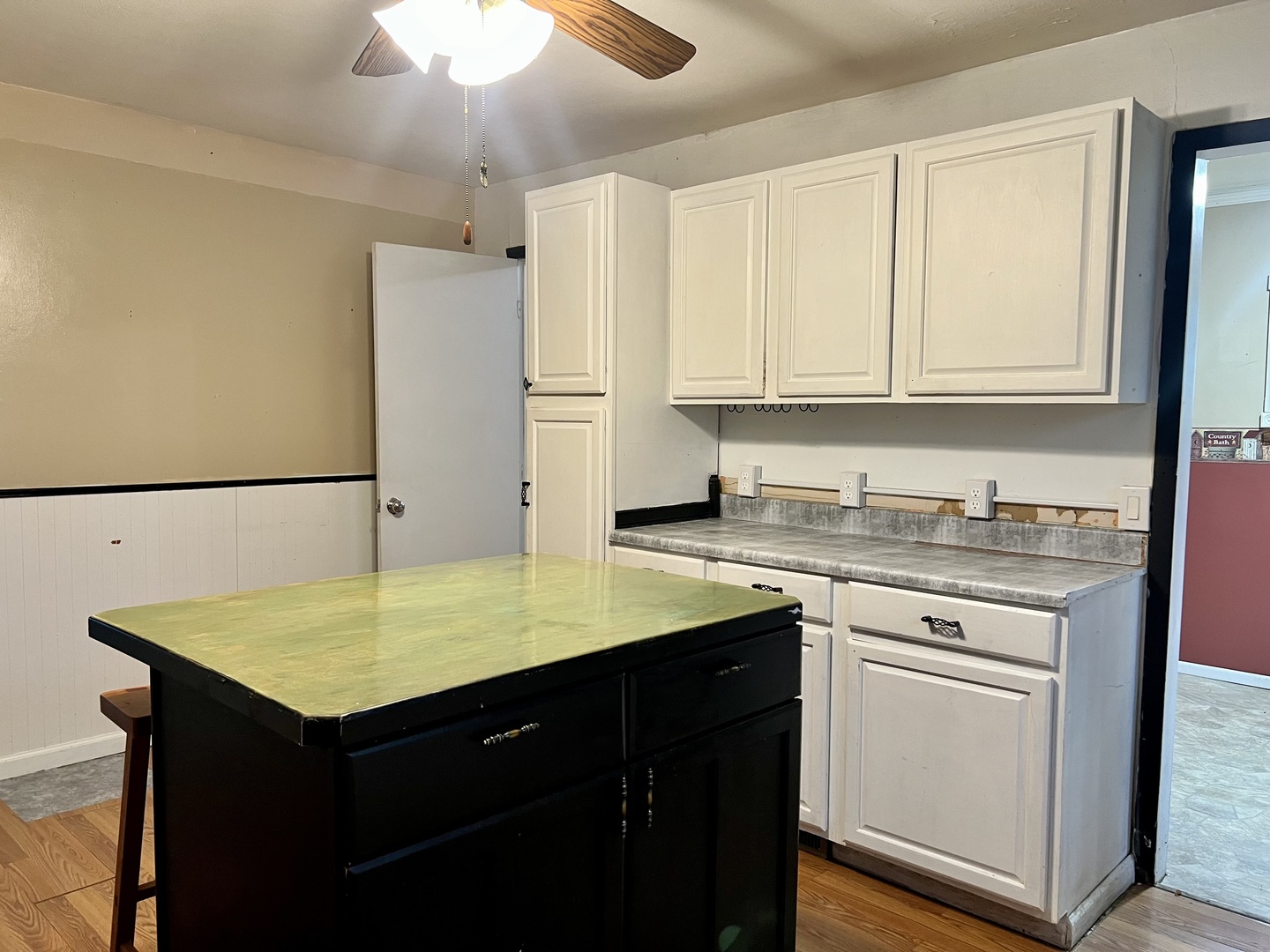375 West Franklin Street Paxton, IL 60957 - Photo 11 of 43 a kitchen with a sink cabinets and a refrigerator