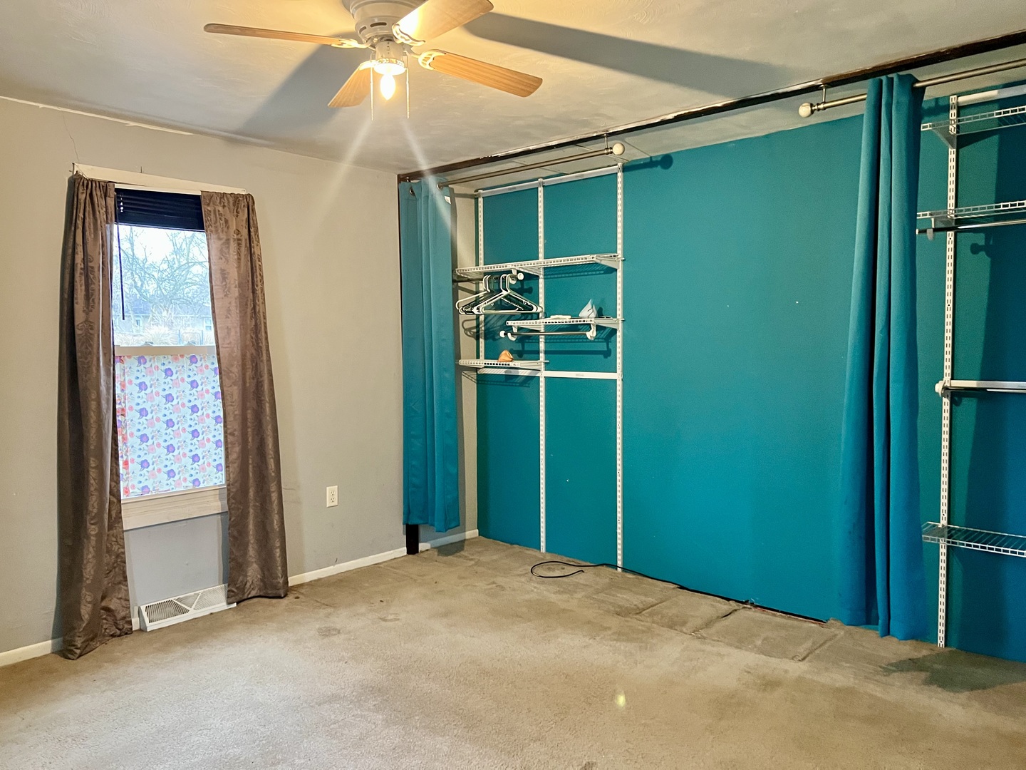 375 West Franklin Street Paxton, IL 60957 - Photo 18 of 43 a view of a room with a fan and closet