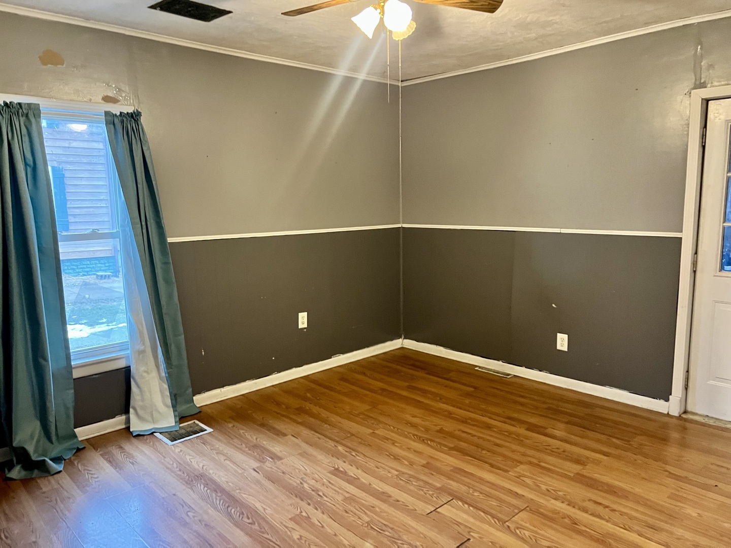 375 West Franklin Street Paxton, IL 60957 - Photo 5 of 43 a view of an empty room with wooden floor