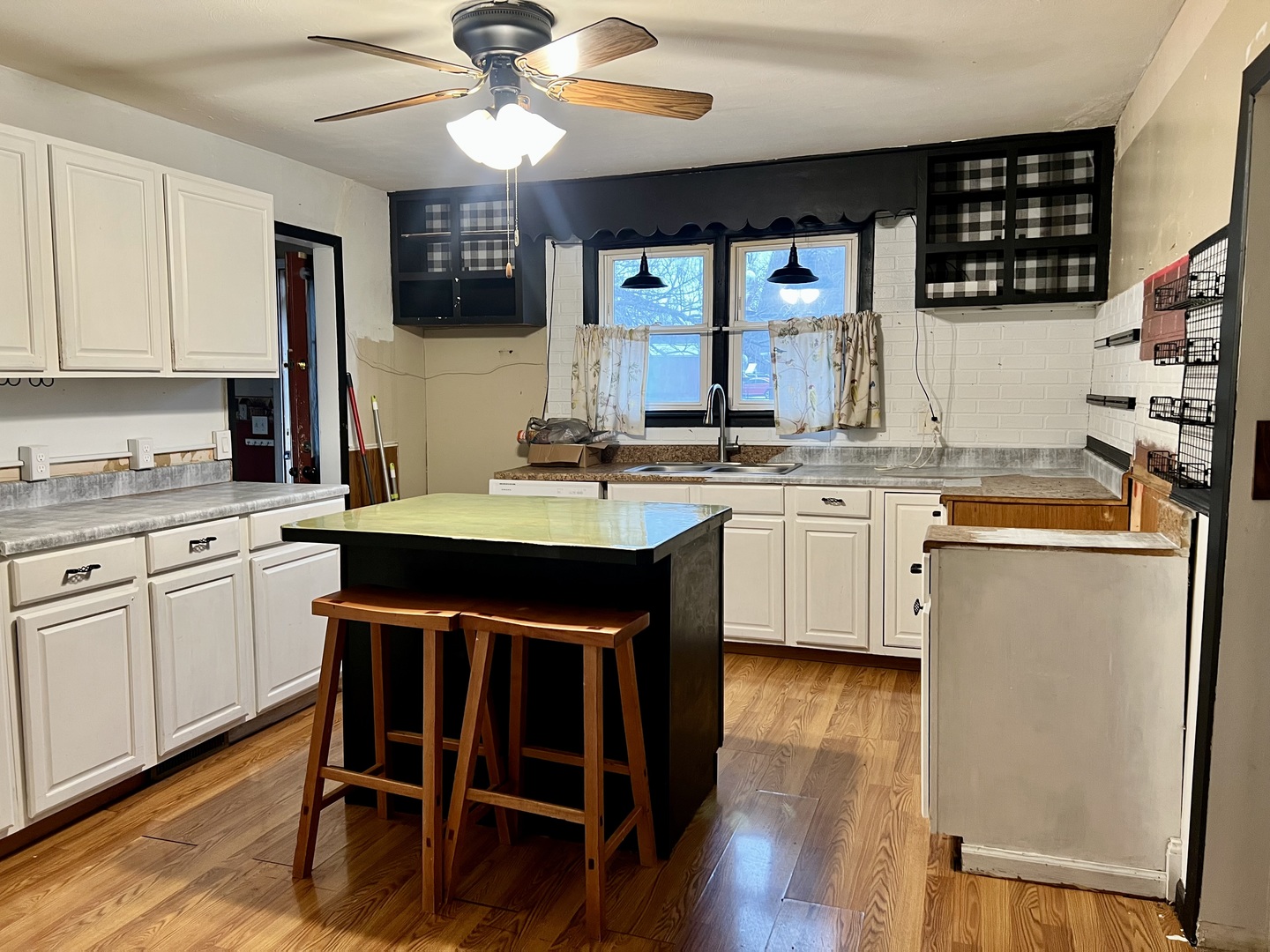 375 West Franklin Street Paxton, IL 60957 - Photo 7 of 43 a kitchen with a sink cabinets and window