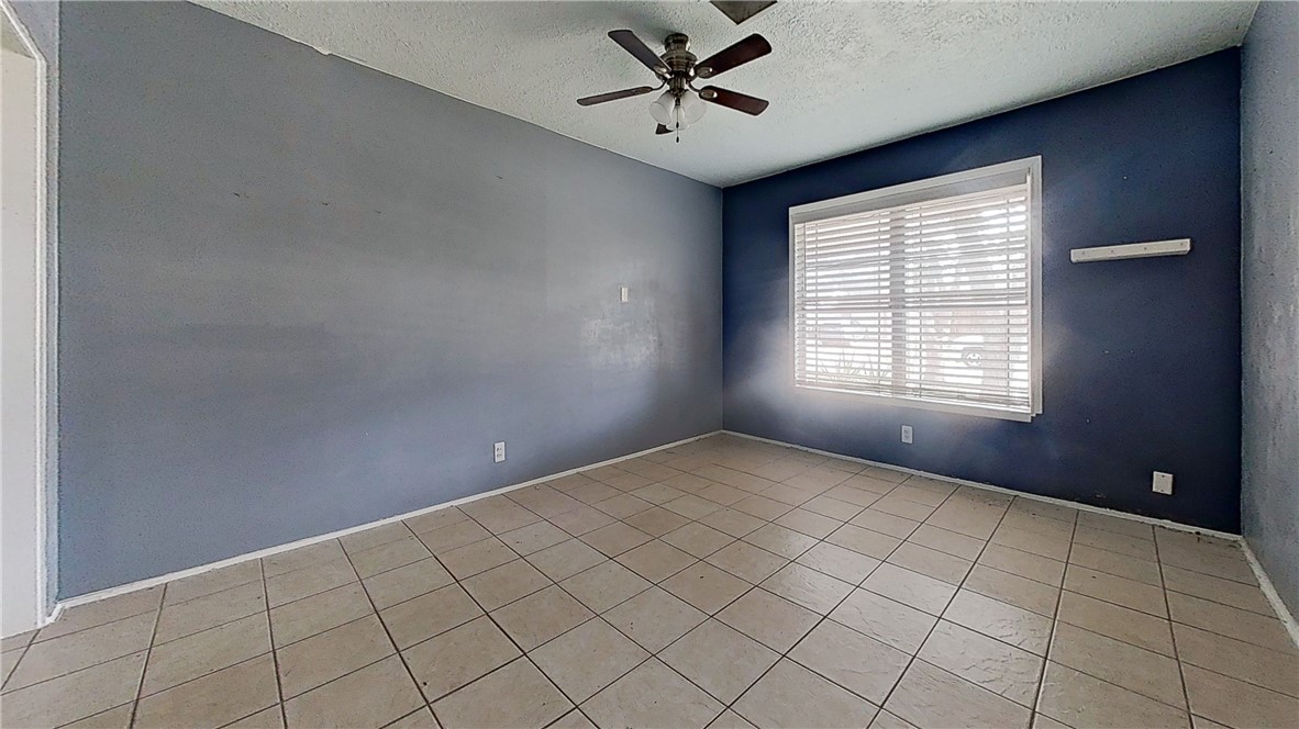 4245 Dody Street Corpus Christi, TX 78411 - Photo 7 of 15 a view of an empty room with a window