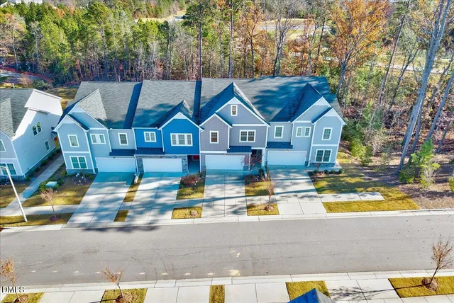 a front view of a house with swimming pool