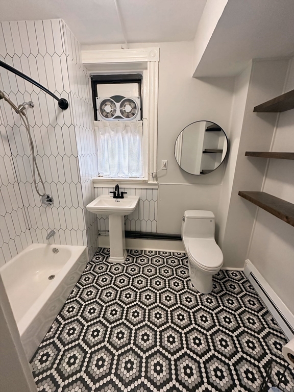 6 Radcliffe Road, Unit B Boston, MA 02134 - Photo 12 of 25 a bathroom with a sink toilet and shower