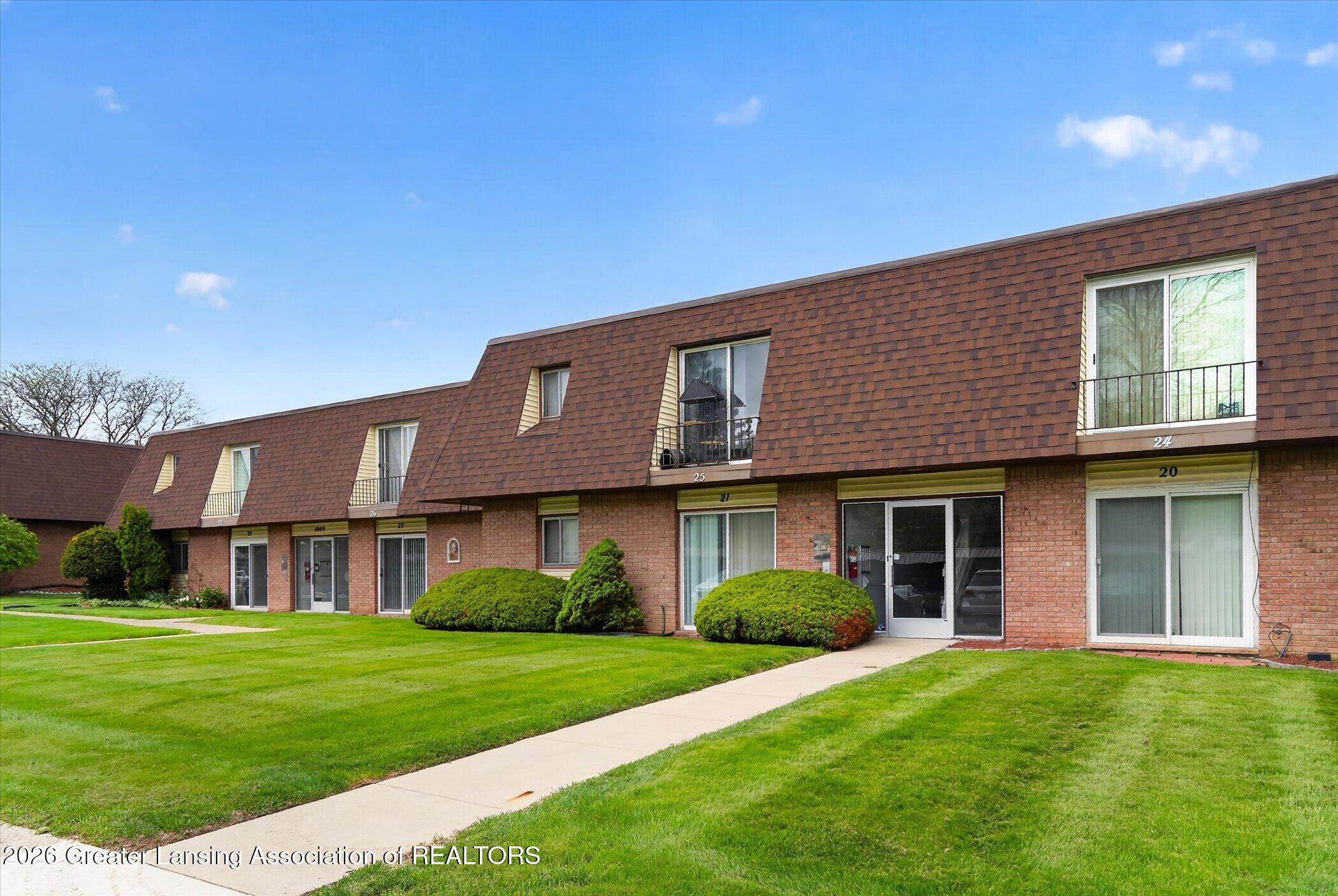 4809 Gull Road, Unit 23 Lansing, MI 48917 - Photo 4 of 26 04-4809-Gull-Rd-apt-23-WindowStill-Real-