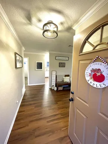 a view of livingroom with furniture wooden floor and window